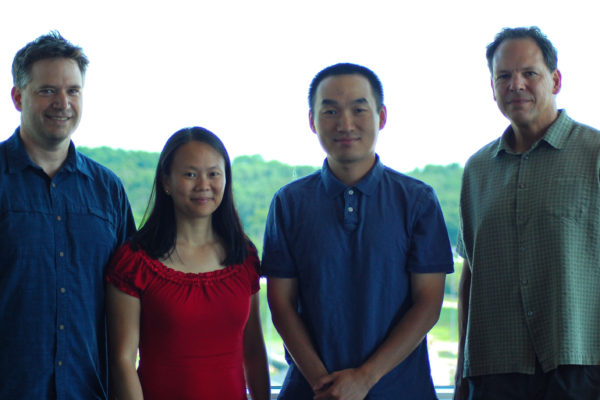 CISR staff members, from left, Sean McIlwain, Irene Ong, Peng Liu, and C. David Page